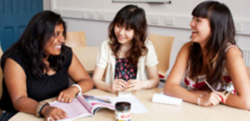 Three students at a table