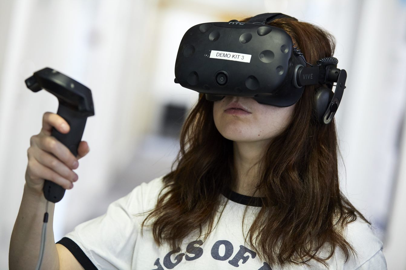 PhD student using VR kit