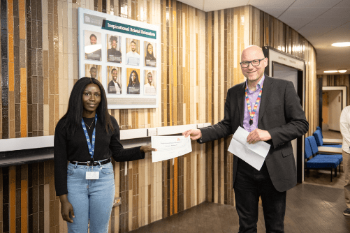 Photo of Stefania Akromah being presented with her certificate by Dean of Science, Jens Marklof.