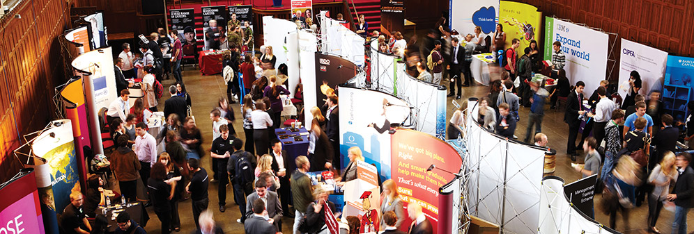 A busy scene at a graduate recruitment fair as students visit the different stands.