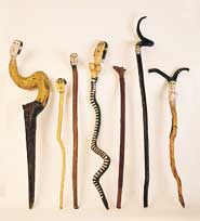 Walking Sticks by José dos Santos: Horned 'Bengala' with Victims; St Anthony; Mario Soares; Woman Serpent; Wolf/Dog Head; Jester 'Bengala'; Unfinished Imp