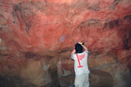 Dr Alistair Pike cutting a sample from a small stalactite formed on the main panel at Tito Bustillo cave, Asturias. About 50mg of sample is required.