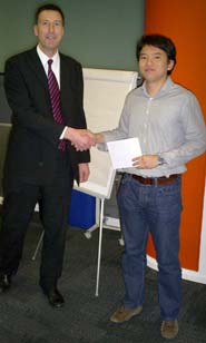 Rupert Bridges (Technical Manager, Frazer-Nash Consultancy, left) with prize-winner Yun Yin