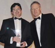 Left to right: Christian Carter, Personnel Manager at the University with Rory Bremner, satirist, who presented the Award.
