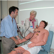 Professor Judy Harris and a medical student with STAN, the manikin in the Applied and Integrated Medical Sciences Centre for Excellence in Teaching and Learning (AIMS CETL)