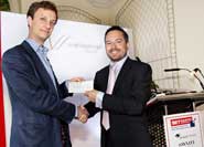Jerome Vaughan of Aragreen (left) receives the Elevator Pitch prize from Nathan Guest, partner at Veale Wasbrough Vizards