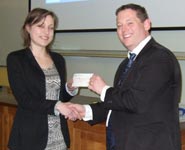 Alan Bailey, Chairman of Low Carbon South West, presenting Jo Humphrey with her £500 winner’s prize