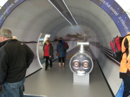 Visitors enjoying the model of the LHC tunnel
