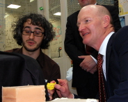 Dr Adam Spiers, from the Bristol Robotics Laboratory demonstrates telehaptic technology to David Willetts, Minister for Universities and Science