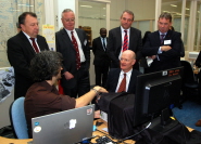 Dr Adam Spiers, from the BRL, demonstrates telehaptic technology to David Willetts. Back row (l-r): Mr David Gillatt (Lead Consultant in Urology, North Bristol NHS Trust and Medical Director of the Bristol Urological Institute, Professor Eric Thomas (Vice-Chancellor, University of Bristol), Dr Mark Callaway (Consultant Radiologist, UH Bristol NHS Foundation Trust) and Professor Steve West (Vice-Ch