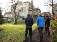 Volunteers survey the garden of Clifton Hill House