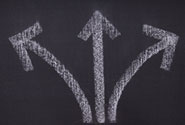 Image of three arrows on a blackboard representing decision making