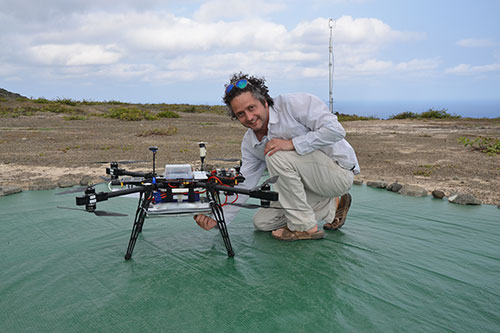 Image of Dr Rick Thomas and the updated system with flasks for air sampling