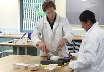 PhD student supervising ice-block experiment