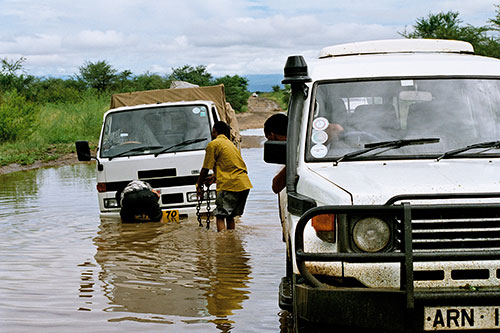 Image of vehicles stuck in flood water in Africa