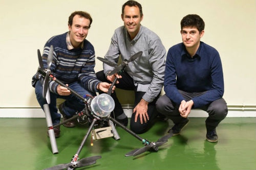 Dr Tom Scott (centre) and his Imitec colleagues with their 'drone for good'