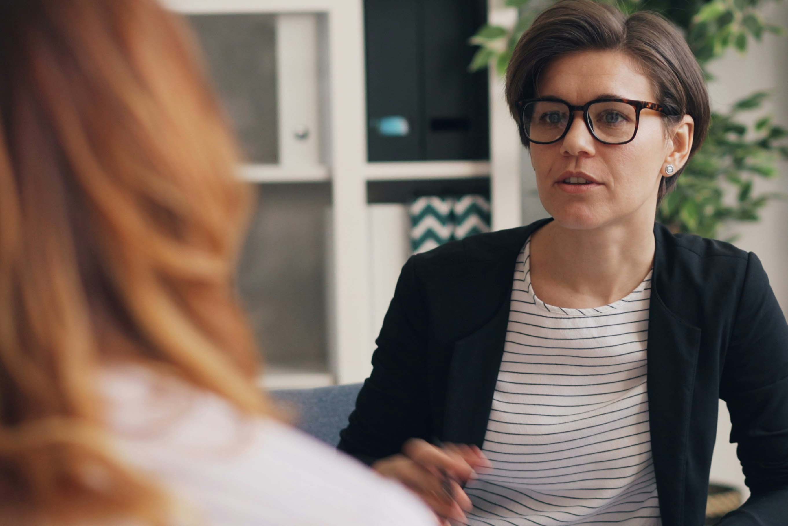 A stock image of two people talking