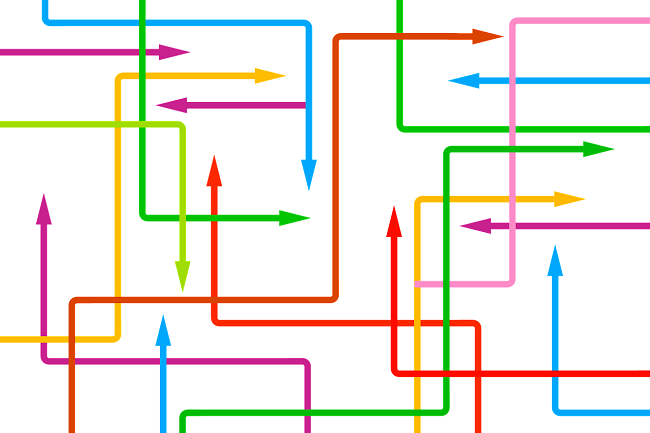 Brightly coloured arrow lines pointing and travelling in different directions