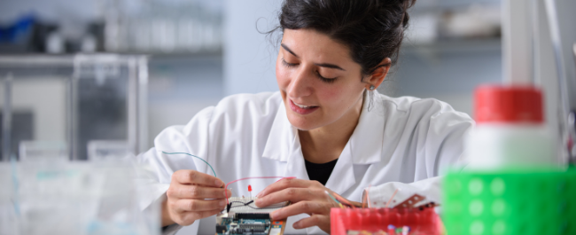 Medical researcher of Cellular and Molecular Medicine, Dr Sara Correia Carreira, a Vice-Chancellor’s Fellow, working in a lab.