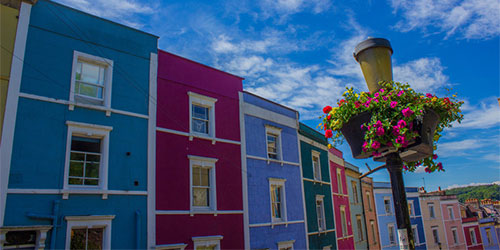 Brightly coloured terraced houses in the city of Bristol.