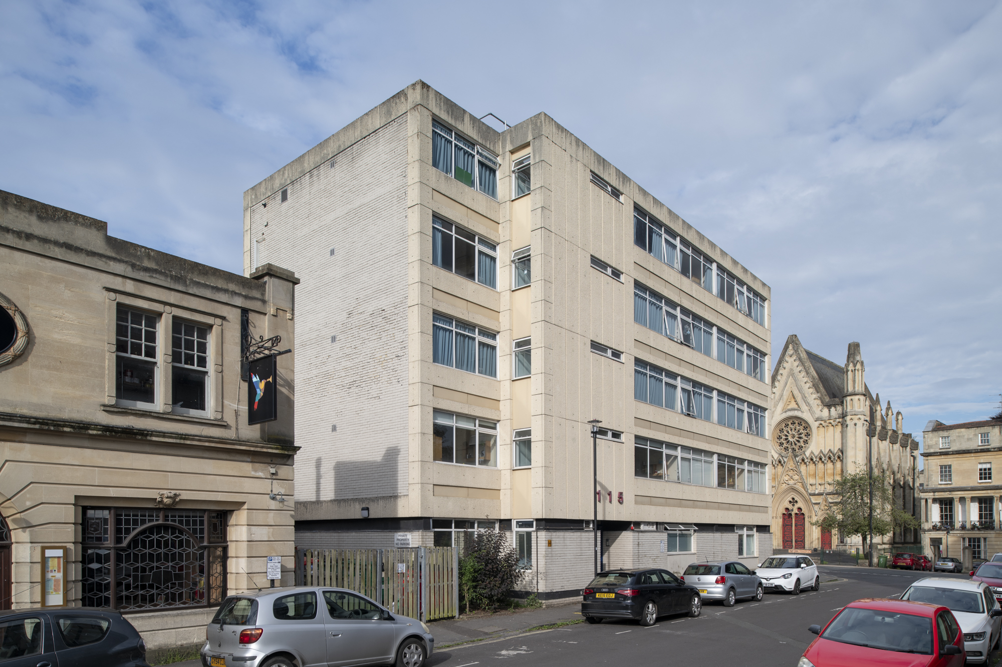 Exterior view of 115 Queens Road, a five storey modern building