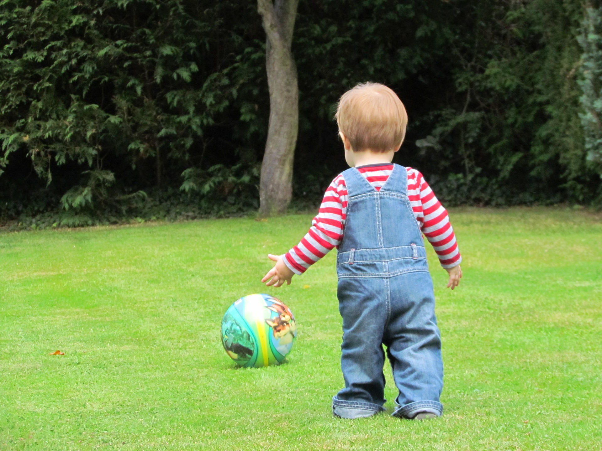 Toddler with football