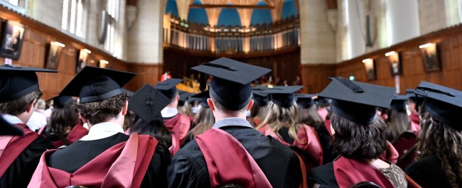 Students wearing mortarboards at graduation