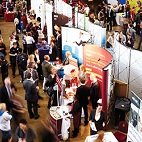 A careers fare with lots of people around the stalls.