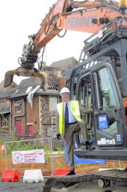 Vice Chancellor Professor Eric Thomas signifies the start of demolition work on the site of the Old Children's Hospital