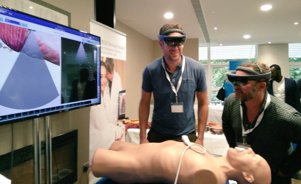 Dave and Rich using a Hololens at HPSN17