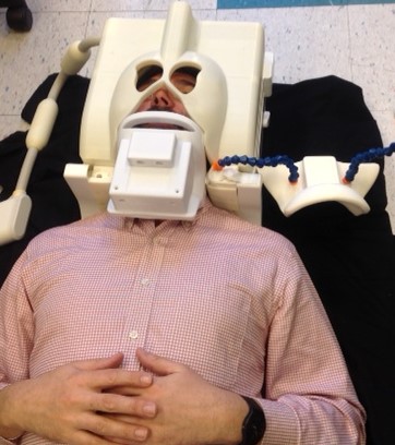 Dr Warr testing his new design for patient comfort using a 'sleep test'