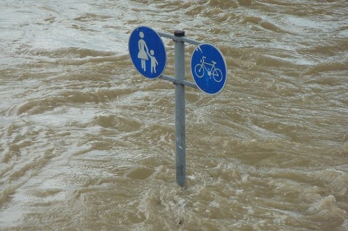 high water around street sign