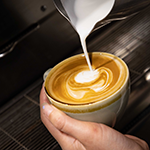 Image of coffee being made from barrista machine