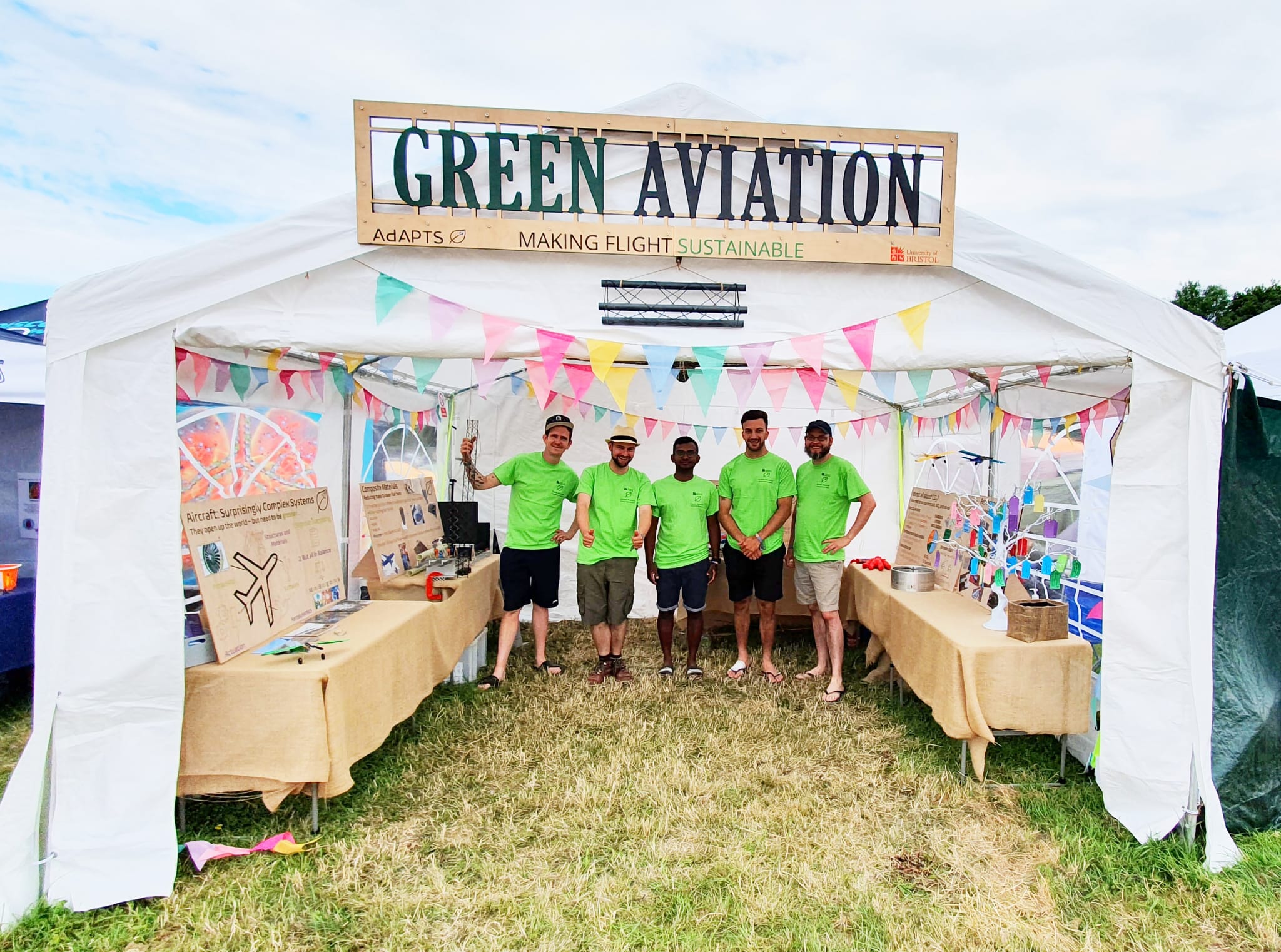 Image of Glastonbury volunteers in bright green tshirts