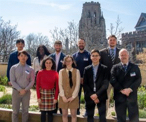 Photo of the 2021 CoSEM CDT cohort standing with Prof. Hamerton with the Wills Memoria Building in the background