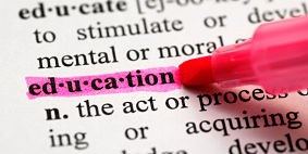 The word education highlighted in pink pen