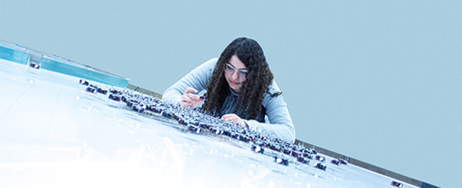 Female student working with nanobots