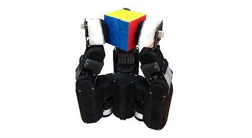 Robot hand holding a Rubik's cube