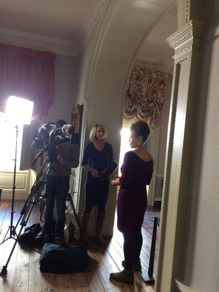 Photo of Josie Gill speaking to camera at Georgian House
