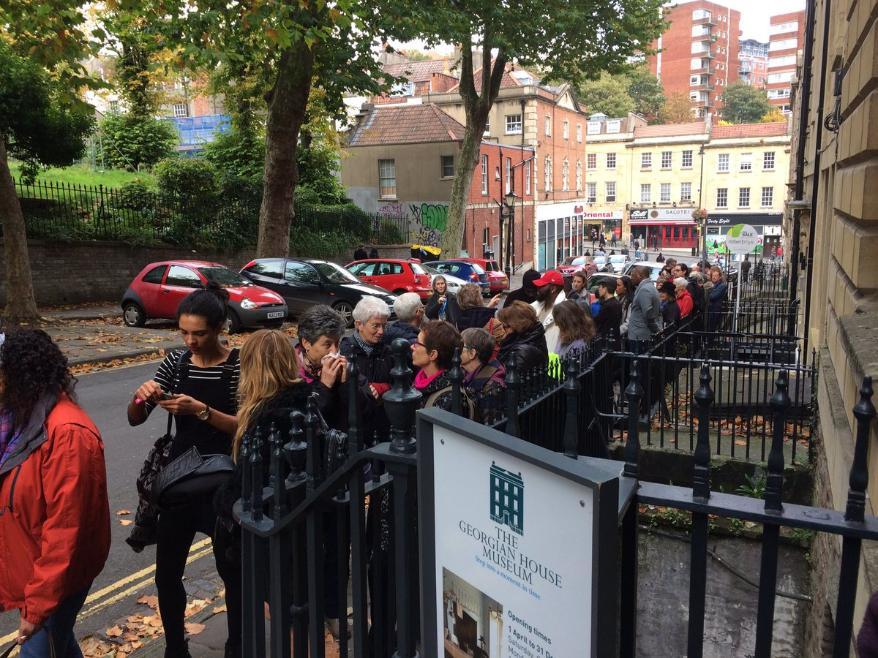 Photo of people queuing outside Georgian House
