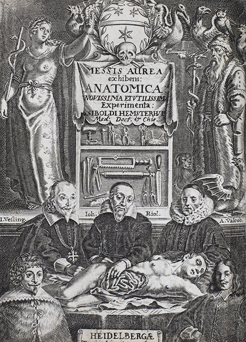 Frontispiece of book showing three surgeons carrying out a dissection.