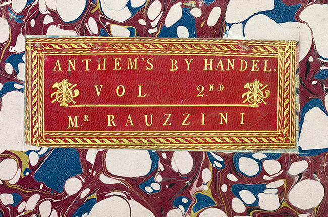 Front cover of Anthems by Handel volume 2 showing title against a marbled background.