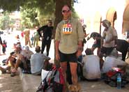 Professor Nick Norman (still standing) at the end of the Marathon des Sables in Tazzarine