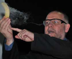 A scene from ‘A Pollutant’s Tale’. Tim Harrison, Bristol ChemLabS School Teacher Fellow, demonstrates the freezing of a banana by dipping it into liquid nitrogen. A member of the audience is often encouraged to shatter it with a hammer behind a protective shield.