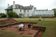 Archaeologists digging in Jenner's garden