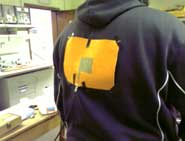 Wearable textile antenna worn on the back