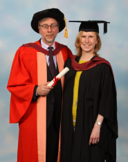 Professor Paul O'Prey receives his honorary degree from Helen Galbraith