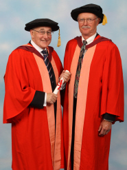 Sir Ian Carruthers OBE receives his honorary degree from Professor Selby Knox, Emeritus Professor in the School of Chemistry