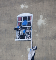 Artwork by Banksy on the wall of a clinic in Park Street, Bristol