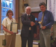 Carole Webb, Chairman of the Friends of the Botanic Gardens, and Nick Wray, Curator of the Botanic Gardens, receive the award from Deputy Lord Mayor of Bristol Colin Smith